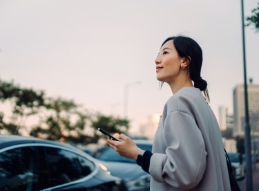 woman looking at phone