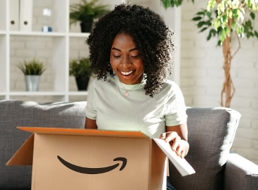woman opening package