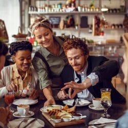 Friends dining out at restaurant