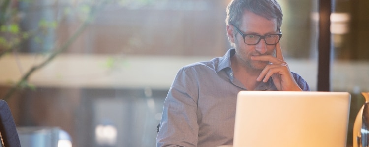 A person checks to see whether their personal information is on the dark web.