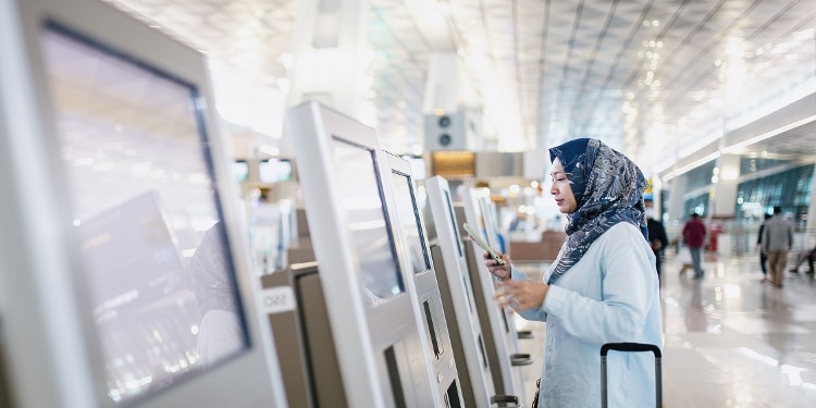 A person uses Global Entry to reenter the U.S. after traveling internationally.