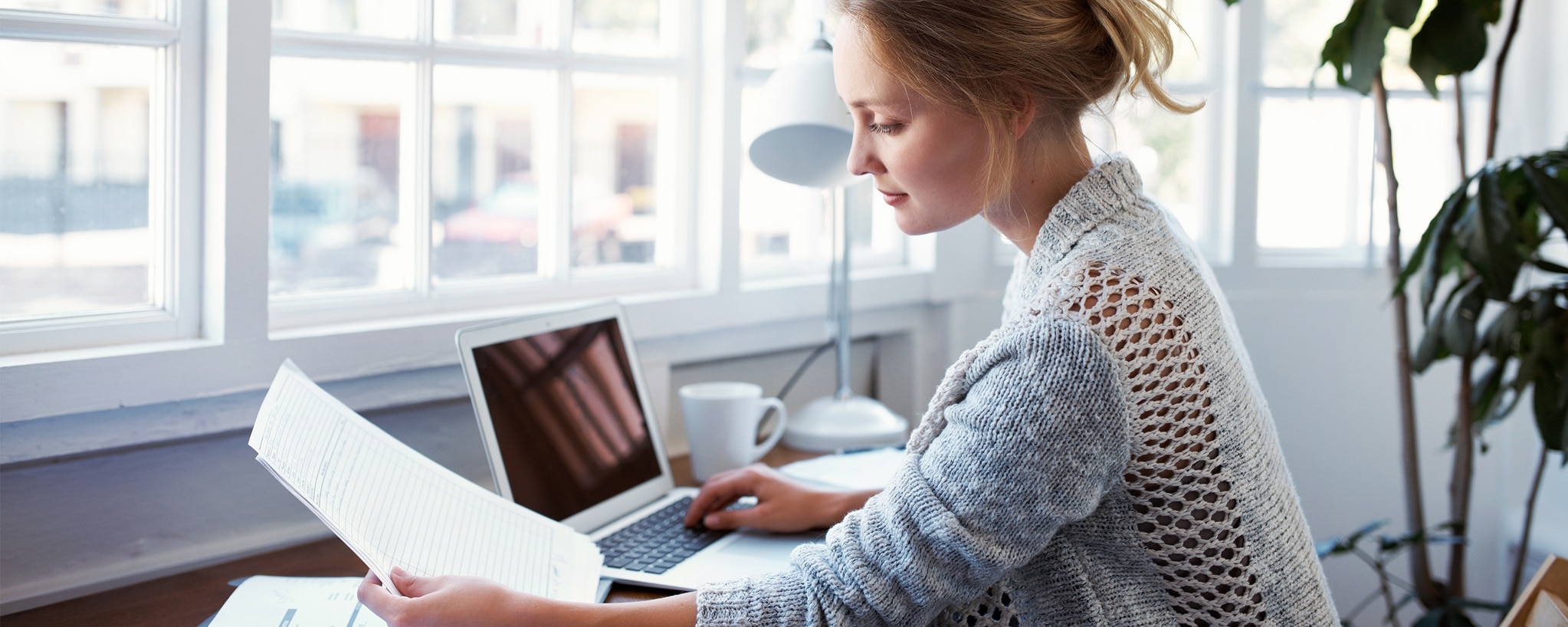 Woman ensures her information wasn’t stolen as part of a phishing scam.