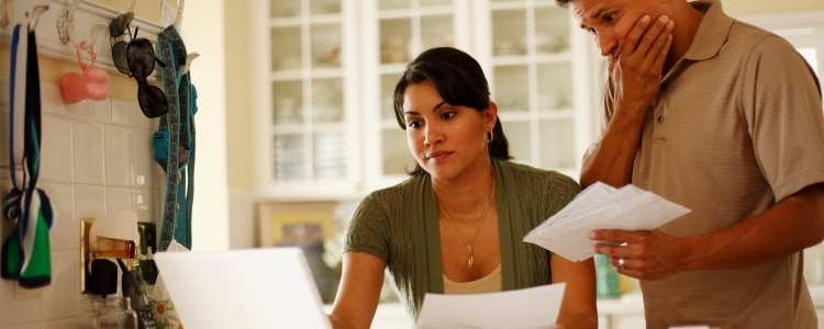 A couple considers their financial situation after a job loss.
