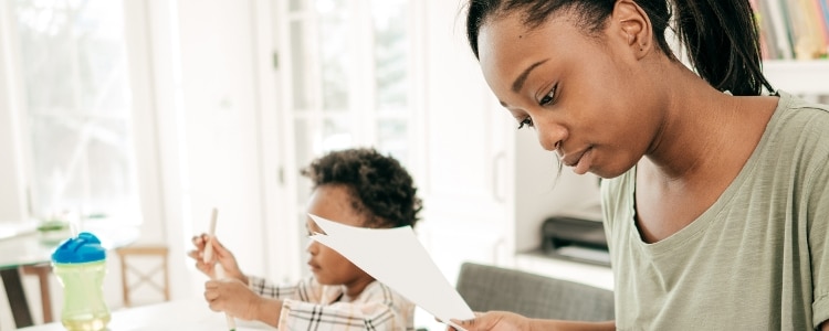 A woman considers different ways to cut her expenses quickly.
