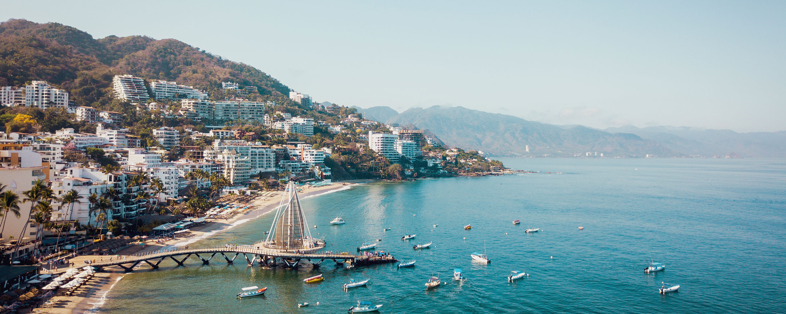 Aerial view of Playa Los Muertos, beach and pier in Puerto Vallarta, Mexico.