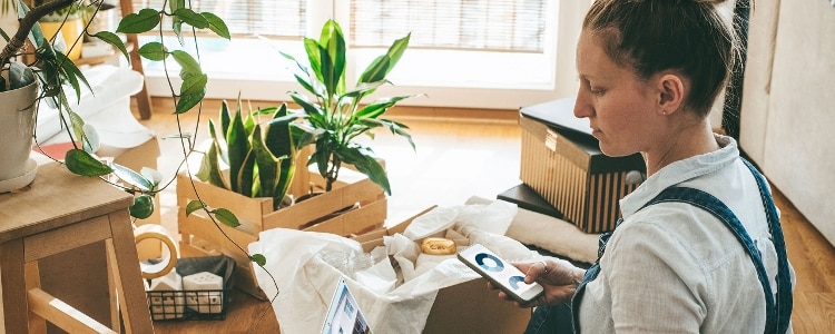 A person checks their credit score on their smartphone.