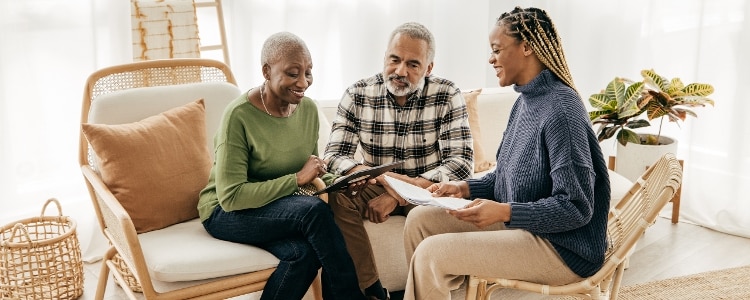 A couple and their financial adviser review SEP IRA options.&nbsp;