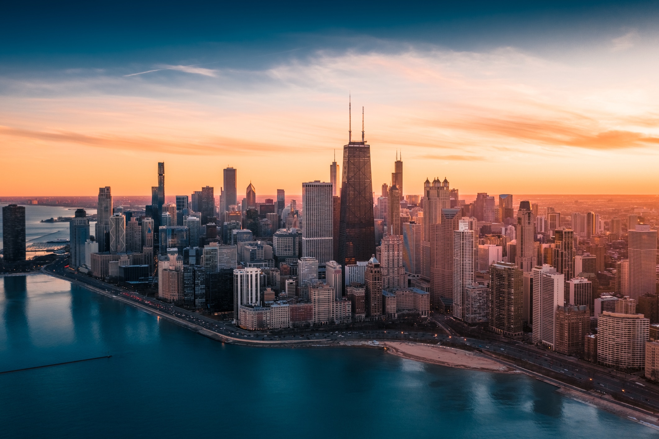 An aerial view of sunset over downtown Chicago.