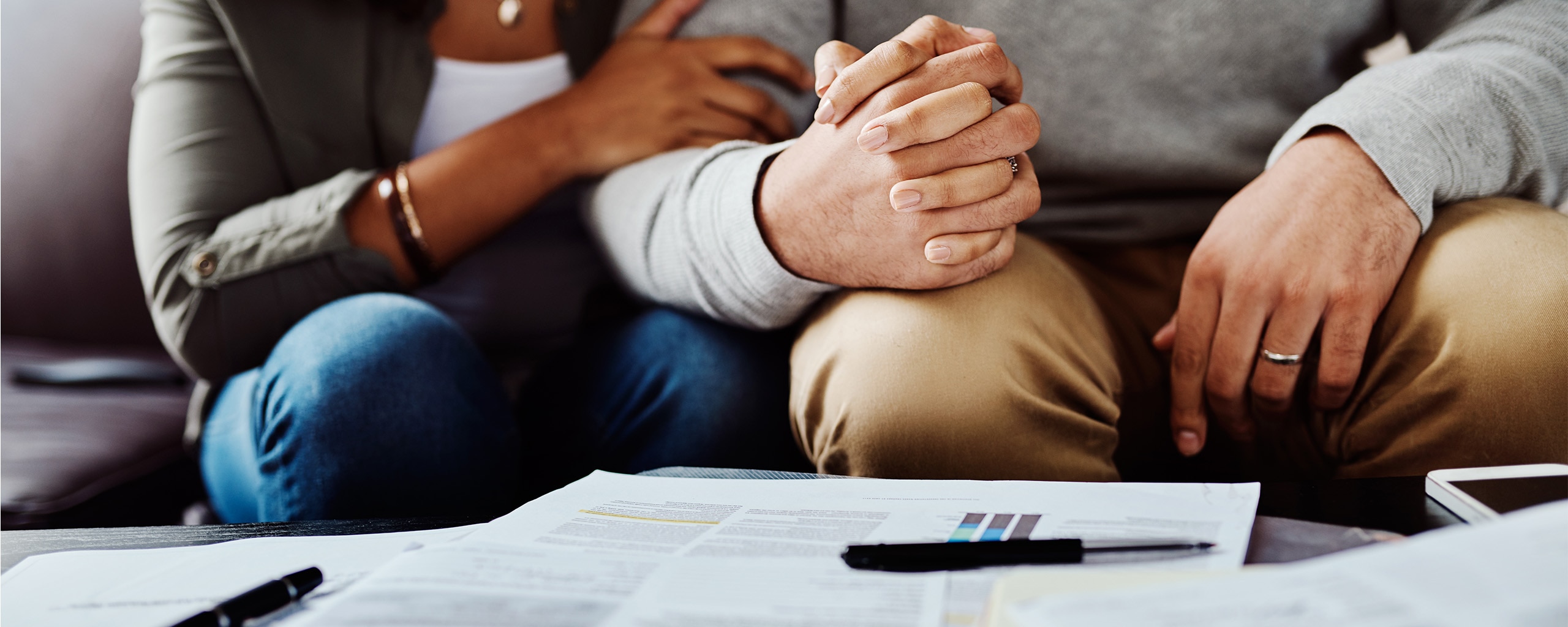 A couple considers life insurance policies as they plan for the future.