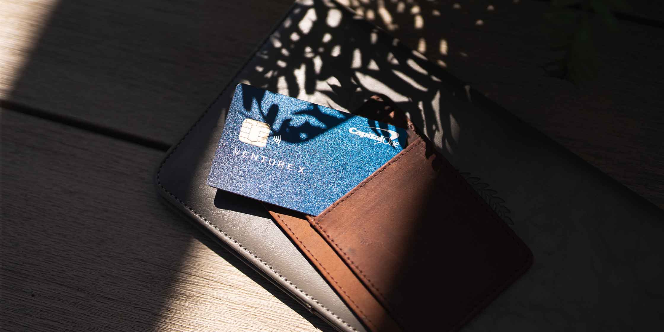 A closeup of the Capital One Venture X travel rewards credit card.