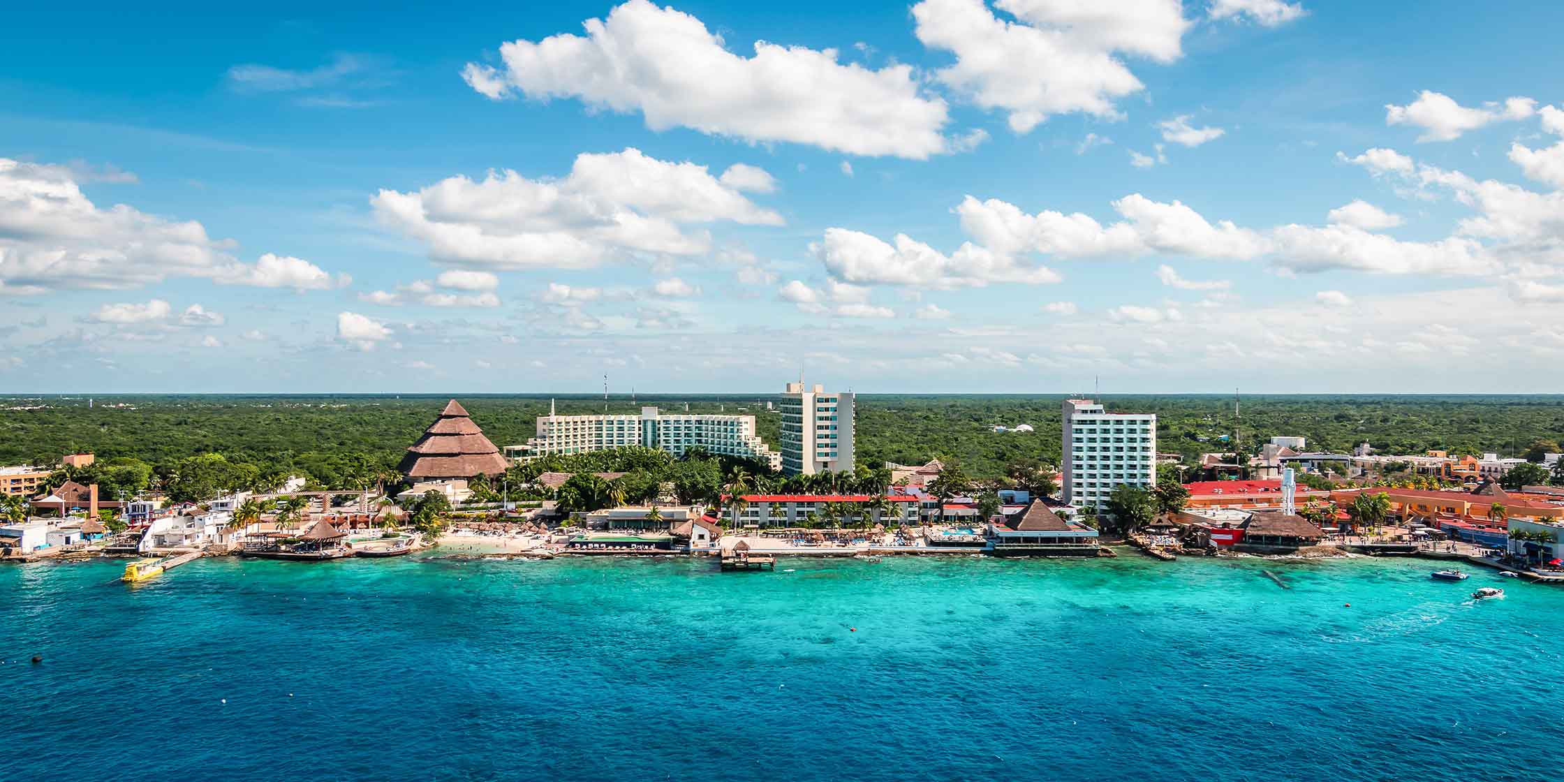 A panoramic view of a harbor and cruise port in Cozumel, Mexico.
