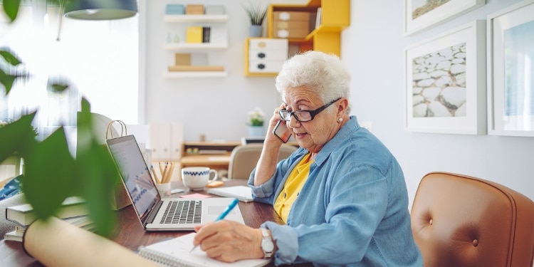 A person calls their credit card issuer to talk about canceling a credit card application.