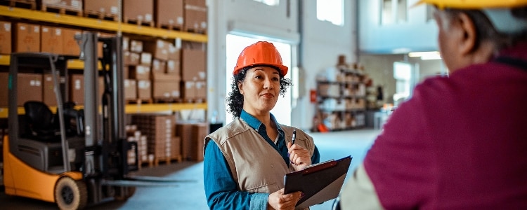 A warehouse manager interviews a job candidate for a high-paying job that doesn’t require a college degree.