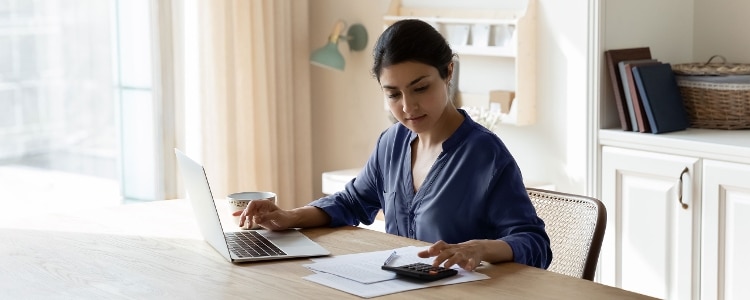 A person calculates their effective tax rate.