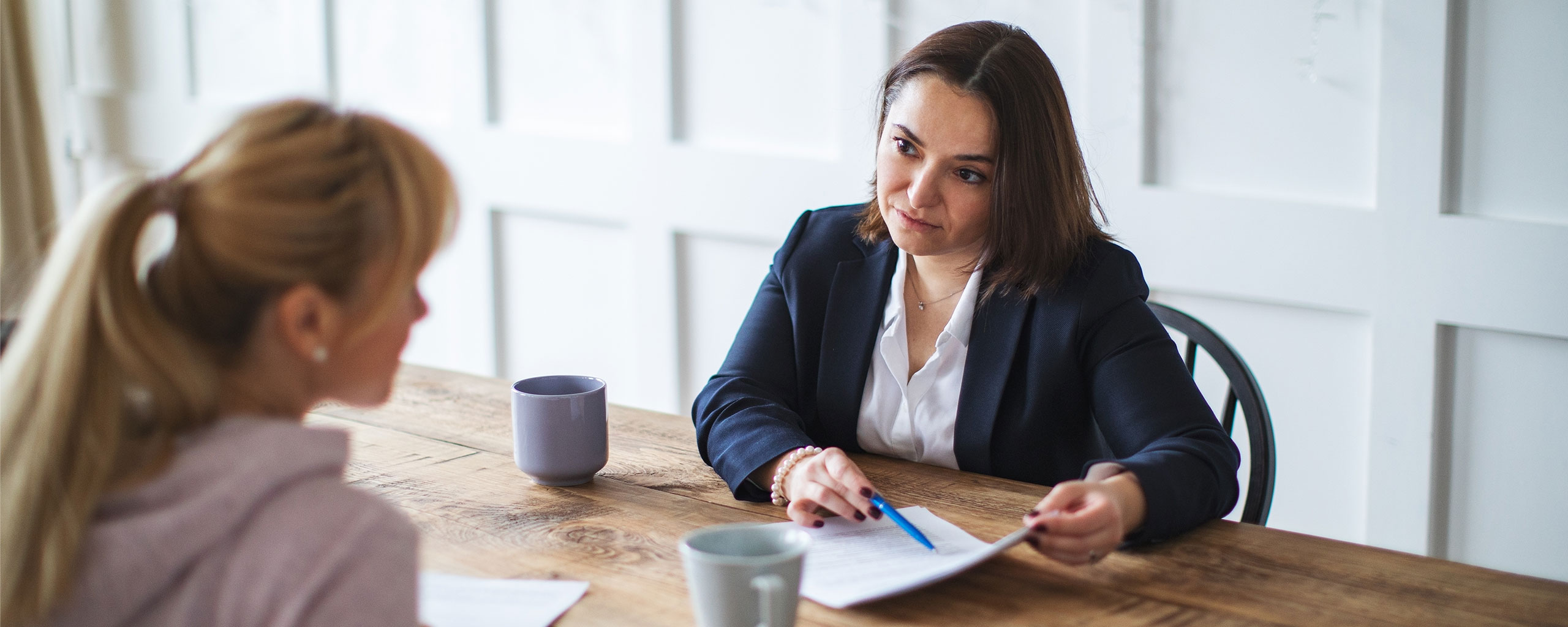 A financial adviser reviews an inheritance with a beneficiary.