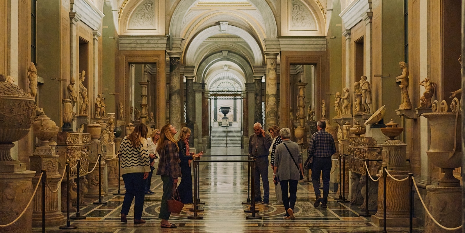 Visitors enjoy an Italian museum.