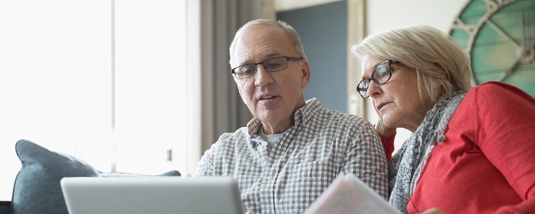 A couple nearing retirement considers buying an annuity.