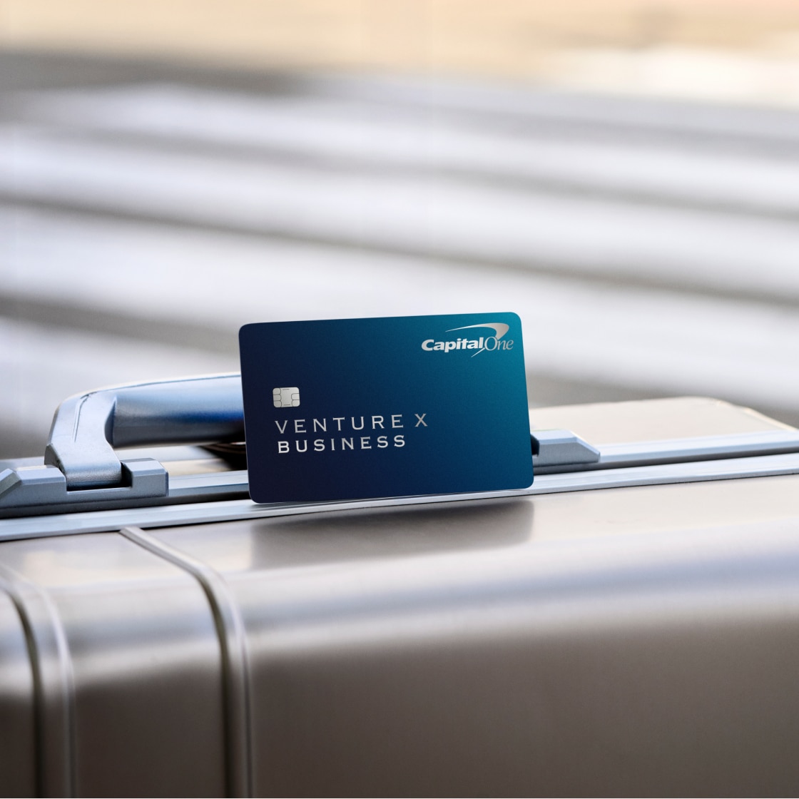 Venture X Business card on suitcase