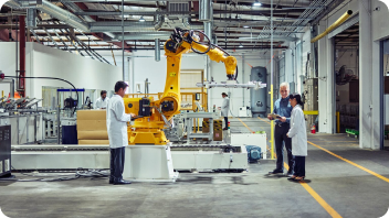people standing around a forklift