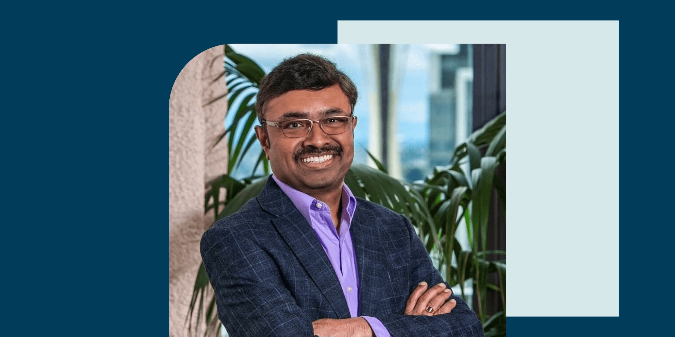 image of Prem Natarajan on blue geometric background