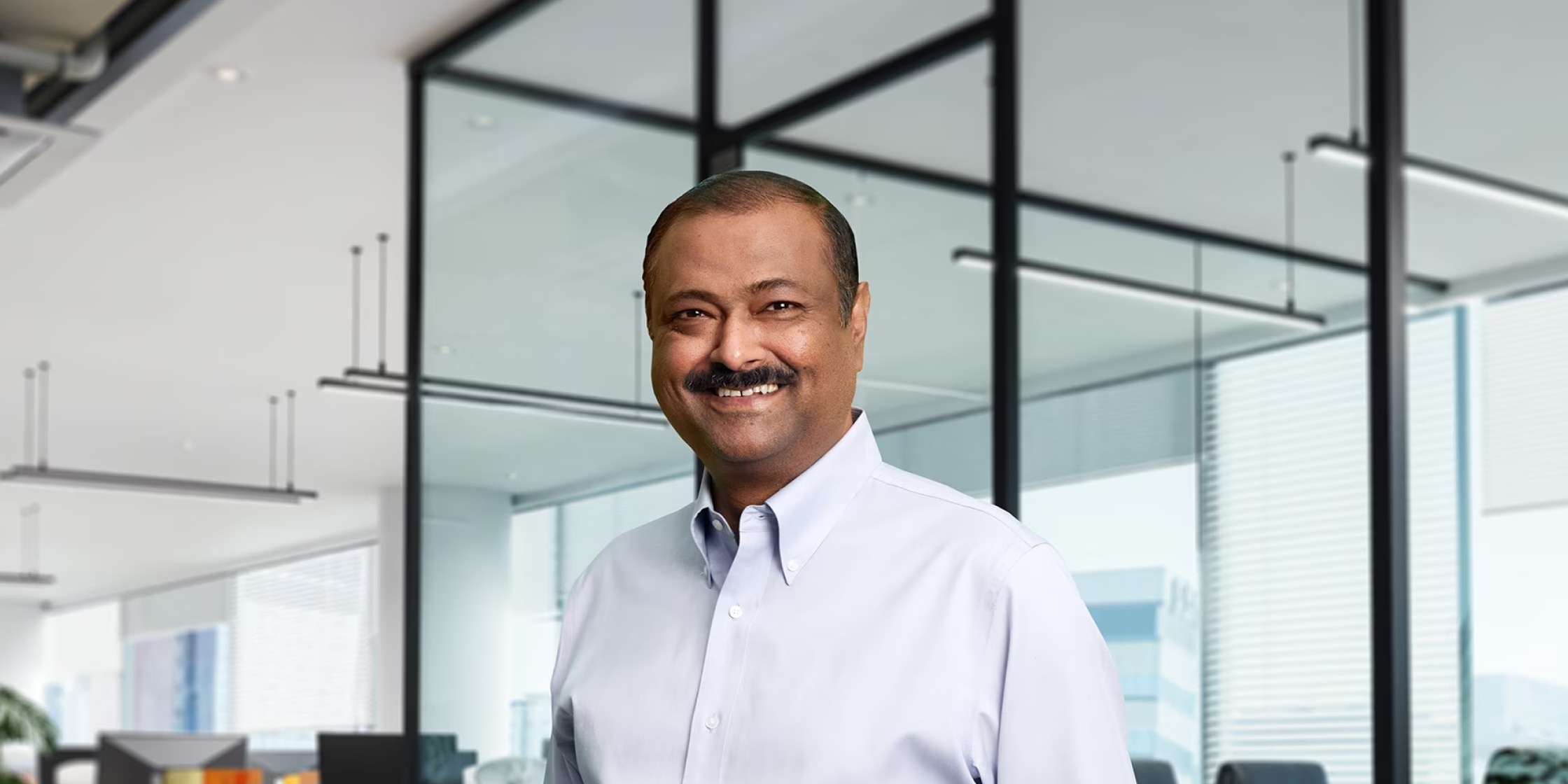 Capital One employee in office