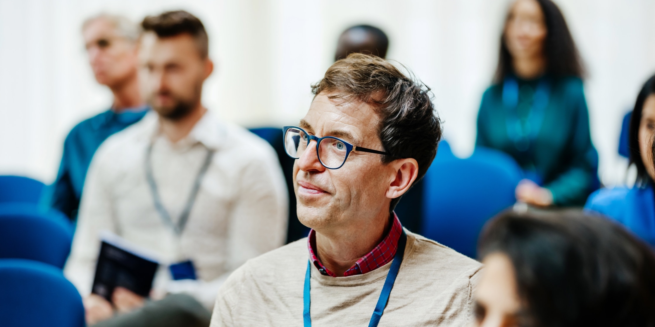 People listening at a conference