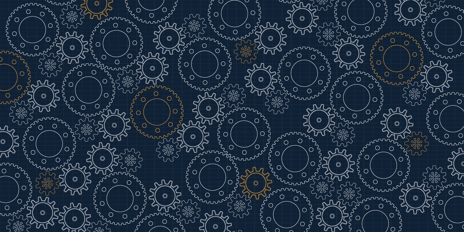 white and yellow gears on black background