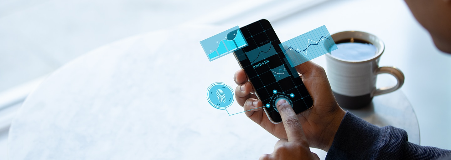 blue and white holographic charts and fingerprints levitating over a black phone screen. finger is touching the screen and shades of blue are around it