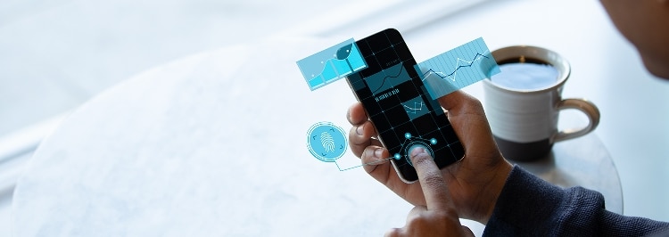 blue and white holographic charts and fingerprints levitating over a black phone screen. finger is touching the screen and shades of blue are around it